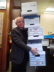 Elwood with a stack of boxes